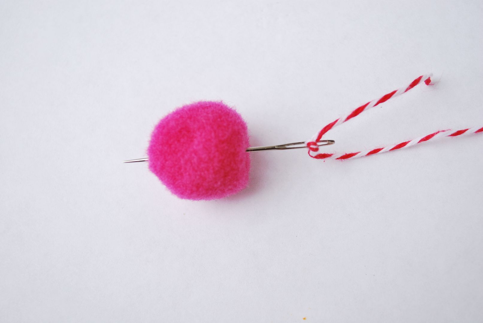 the DIY POM POM GARLAND